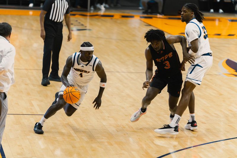 UTEP guard Caleb Blackwell drives the ball against UT Permian Basin Monday night at the Don Haskins Center.