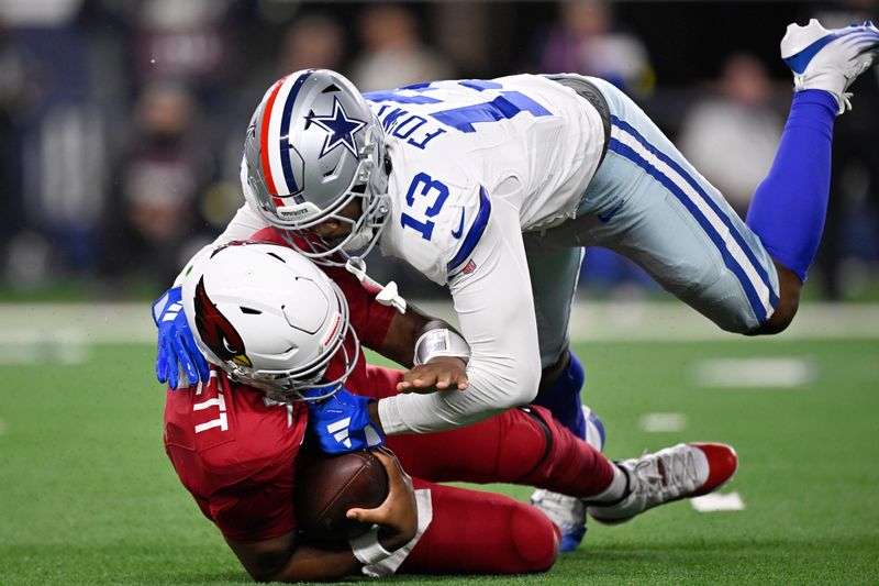 Nov 3, 2025; Arlington, Texas, USA; Dallas Cowboys defensive end Dante Fowler Jr. (13) sacks Arizona Cardinals quarterback Jacoby Brissett (7) in the second half at AT&T Stadium. Mandatory Credit: Jerome Miron-Imagn Images