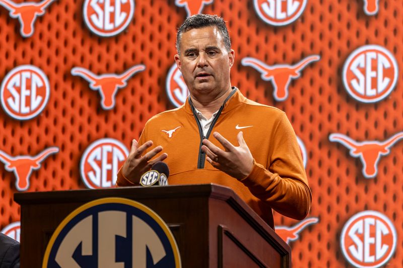 Oct 14, 2025; Birmingham, AL, USA; Texas Longhorns head coach Sean Miller talks with the media during SEC Media Days at Grand Bohemian Hotel. Mandatory Credit: Vasha Hunt-Imagn Images
