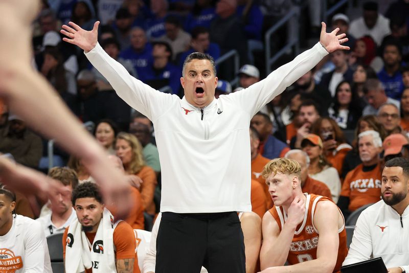 Nov 4, 2025; Charlotte, North Carolina, USA; Texas Longhorns head coach Sean Miller reacts to a play against the Duke Blue Devils during the first half of the Dick Vitale’s Invitational game at Spectrum Center. Mandatory Credit: Cory Knowlton-Imagn Images