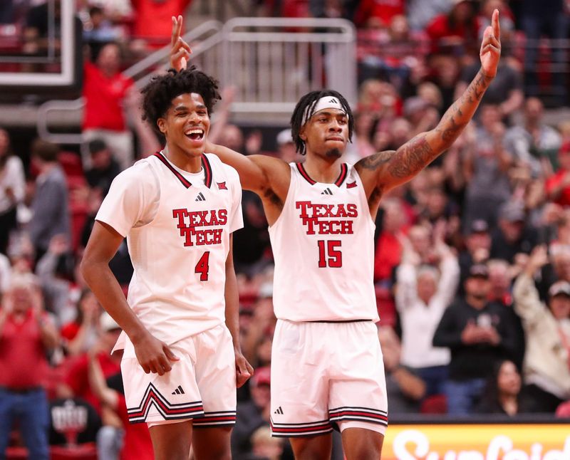 Texas Tech players Christian Anderson (4) and JT Toppin react to a play against Sam Houston during a nonconference men's basketball game, Friday, Nov. 7, 2025, at United Supermarkets Arena.