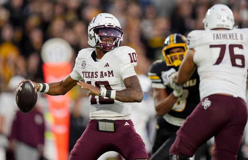 Nov 8, 2025; Columbia, Missouri, USA; Texas A&M Aggies quarterback Marcel Reed (10) throws a pass during the second half against the Missouri Tigers at Faurot Field at Memorial Stadium. Mandatory Credit: Jay Biggerstaff-Imagn Images