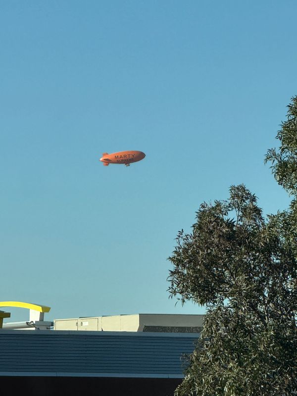 The promotional blimp for "Marty Supreme," a film starring Timothée Chalamet, was spotted hovering over the Sun City early Monday, Nov. 10.