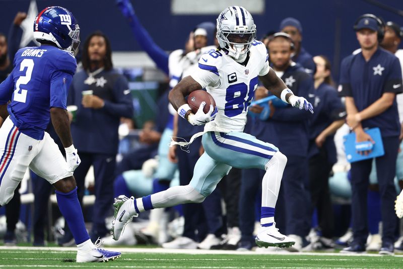 Dallas Cowboys wide receiver CeeDee Lamb (88) runs with the ball against the New York Giants during the second quarter at AT&T Stadium in Arlington, Texas on Sept. 14, 2025.