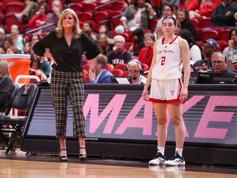 Texas Tech head coach Krista Gerlich (left) and Gemma Núñez look on during non-conference women's basketball game against SMU, Thursday, Nov. 13, 2025, at United Supermarkets Arena.