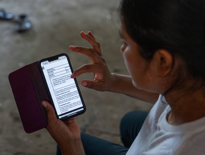 Yessenia Ruano shows the "receipt number" she received from a federal agency in May indicating her application for a trafficking victims' visa was being considered. Despite having a pending T visa application, U.S. immigration officers days later said she had to carry out her own deportation.