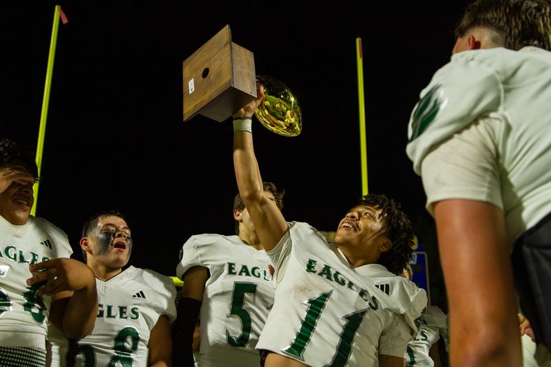 The Grape Creek high school football team celebrates after winning the bi-district championship over Crane at James H. Bird Memorial Stadium in Big Lake on Friday, Nov. 14, 2025.