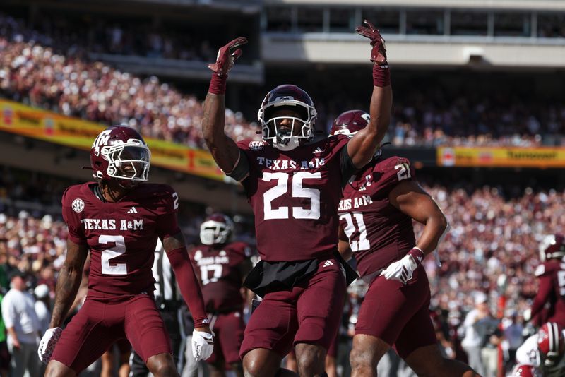 Nov 15, 2025; College Station, Texas, USA; Texas A&M Aggies safety Dalton Brooks (25) reacts after an interception during the second quarter against the South Carolina Gamecocks at Kyle Field. Mandatory Credit: Troy Taormina-Imagn Images