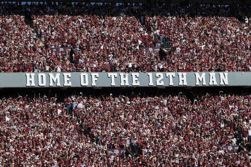 Nov 15, 2025; College Station, Texas, USA; Fans cheer during the game between the Texas A&M Aggies and the South Carolina Gamecocks at Kyle Field. Mandatory Credit: Troy Taormina-Imagn Images