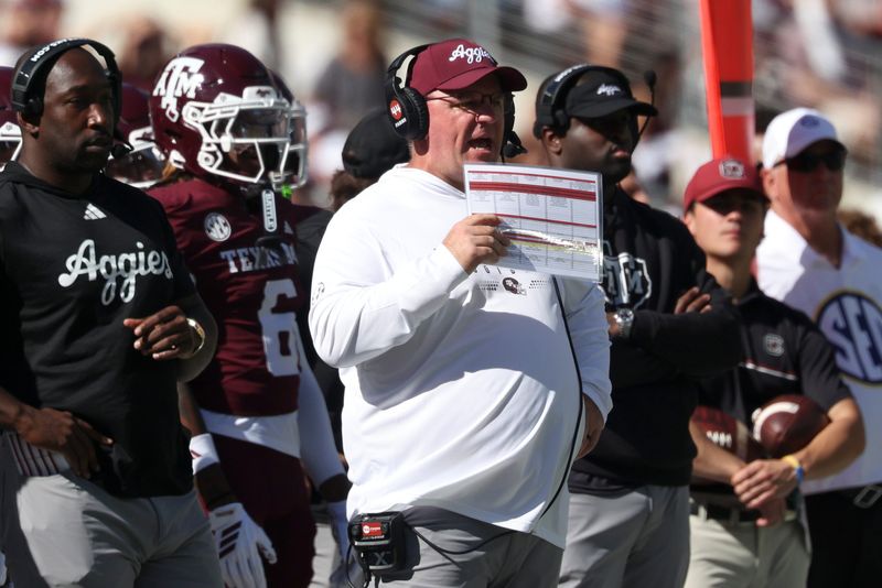 Nov 15, 2025; College Station, Texas, USA; Texas A&M Aggies head coach Mike Elko reacts on the sideline during the second quarter against the South Carolina Gamecocks at Kyle Field. Mandatory Credit: Troy Taormina-Imagn Images