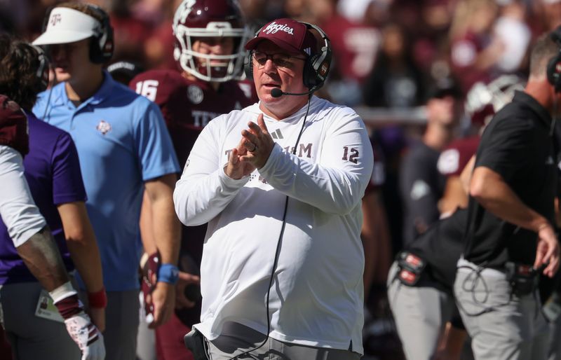 Nov 15, 2025; College Station, Texas, USA; Texas A&M Aggies head coach Mike Elko reacts during the second quarter against the South Carolina Gamecocks at Kyle Field. Mandatory Credit: Troy Taormina-Imagn Images