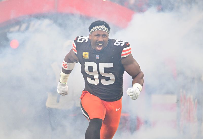 Nov 16, 2025; Cleveland, Ohio, USA; Cleveland Browns defensive end Myles Garrett (95) runs out during player introductions prior to a game against Baltimore Ravens at Huntington Bank Field. Mandatory Credit: Ken Blaze-Imagn Images