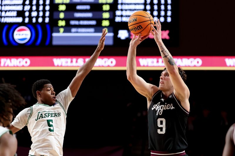 Nov 21, 2025; College Station, Texas, USA; Texas A&M Aggies guard Ruben Dominguez (9) shoots a three point basket for a program record 10 three point baskets in a single game against the Manhattan Jaspers during the second half at Reed Arena.