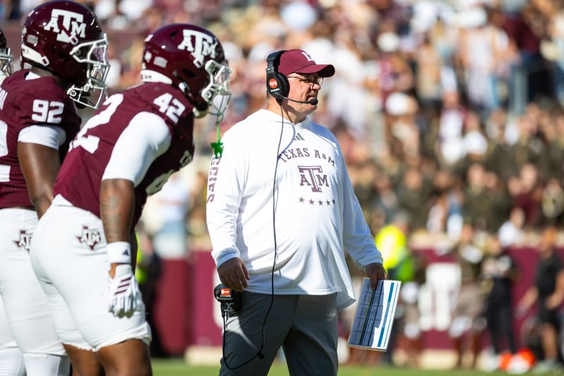 Nov 22, 2025; College Station, Texas, USA; Texas A&M Aggies head coach Mike Elko on the field in the second half of a game against the Samford Bulldogs at Kyle Field. Mandatory Credit: Joseph Buvid-Imagn Images