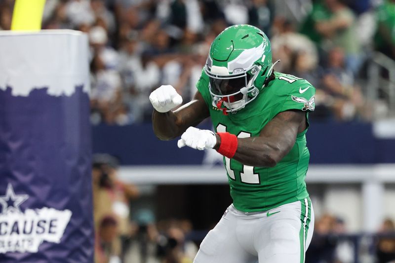 Nov 23, 2025; Arlington, Texas, USA; Philadelphia Eagles wide receiver AJ. Brown (11) celebrates a touchdown in the first quarter against the Dallas Cowboys at AT&T Stadium. Mandatory Credit: Kevin Jairaj-Imagn Images