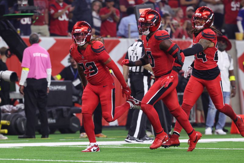 Nov 20, 2025; Houston, Texas, USA; Houston Texans safety Jaylen Reed (23) celebrates after a play during the game against the Buffalo Bills at NRG Stadium. Mandatory Credit: Troy Taormina-Imagn Images
