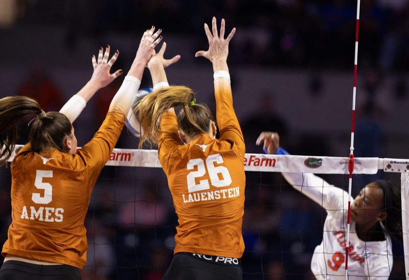 Florida outside hitter Aniya Madkin (9) spikes against Texas middle blocker Ayden Ames (5) and outside hitter Whitney Lauenstein (26) during an NCAA womenâ€™s volleyball game at Steven C. O'Connell Center Exactec arena in Gainesville, FL on Friday, November 7, 2025. [Alan Youngblood/Gainesville Sun]