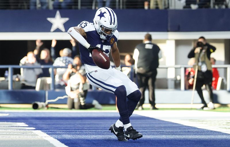 Nov 27, 2025; Arlington, Texas, USA; Dallas Cowboys running back Malik Davis (43) celebrates after running for a touchdown against the Kansas City Chiefs during the second quarter at AT&T Stadium. Mandatory Credit: Kevin Jairaj-Imagn Images