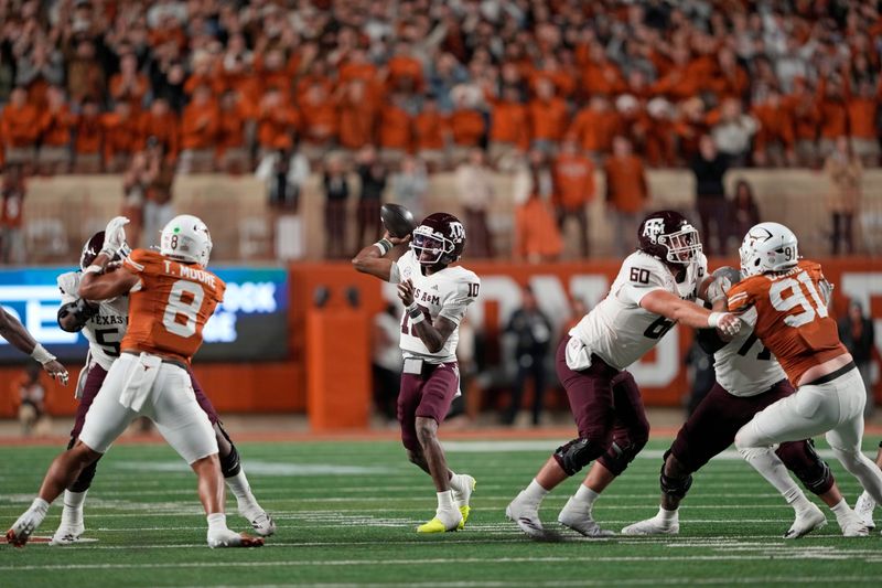 Nov 28, 2025; Austin, Texas, USA; Texas A&M Aggies quarterback Marcel Reed (10) throws a pass during the first half against the Texas Longhorns at Darrell K Royal-Texas Memorial Stadium. Mandatory Credit: Scott Wachter-Imagn Images