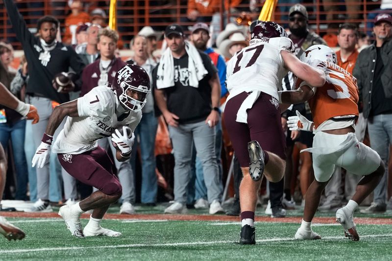 Nov 28, 2025; Austin, Texas, USA; Texas A&M Aggies wide receiver KC Concepcion (7) runs for a touchdown at the end of the first half against the Texas Longhorns at Darrell K Royal-Texas Memorial Stadium. Mandatory Credit: Scott Wachter-Imagn Images