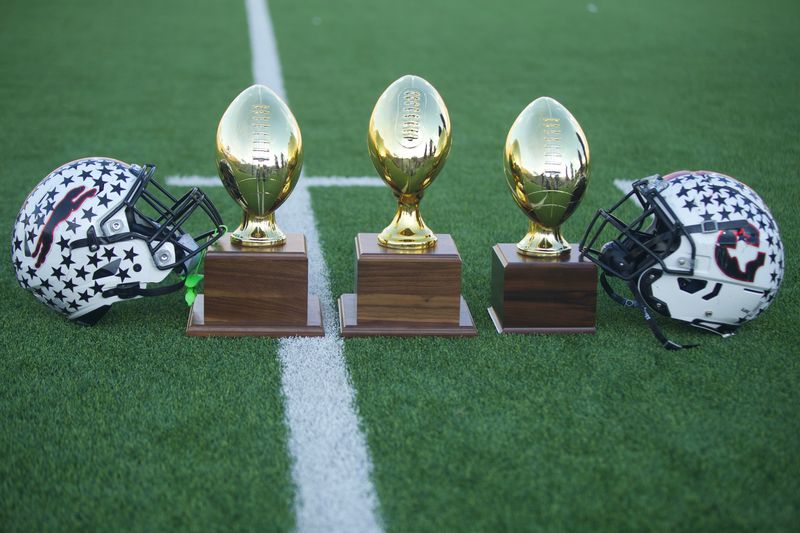 Gruver helmets sit against the team's playoff trophies after the Greyhounds beat Ropes 23-13 in a Region I-2A Division II semifinal game at Happy State Bank Stadium on Nov. 28, 2025.