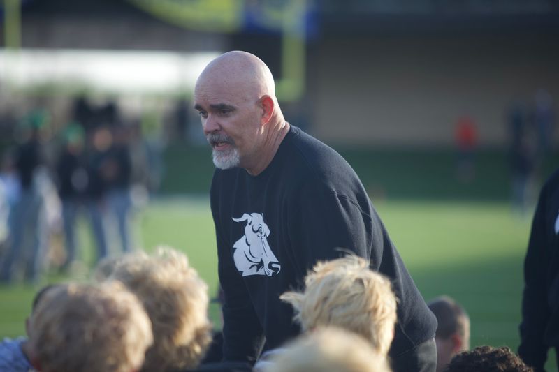Gruver head coach Kurt Haberthur talks to his team after the Greyhounds defeated Ropes 23-13 in a Region I-2A Division II semifinal game at Happy State Bank Stadium on Nov. 28, 2025.