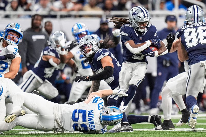 Detroit Lions linebacker Trevor Nowaske (53) tackles Dallas Cowboys kick returner KaVontae Turpin (9) during the second half at Ford Field in Detroit on Thursday, Dec. 4, 2025.