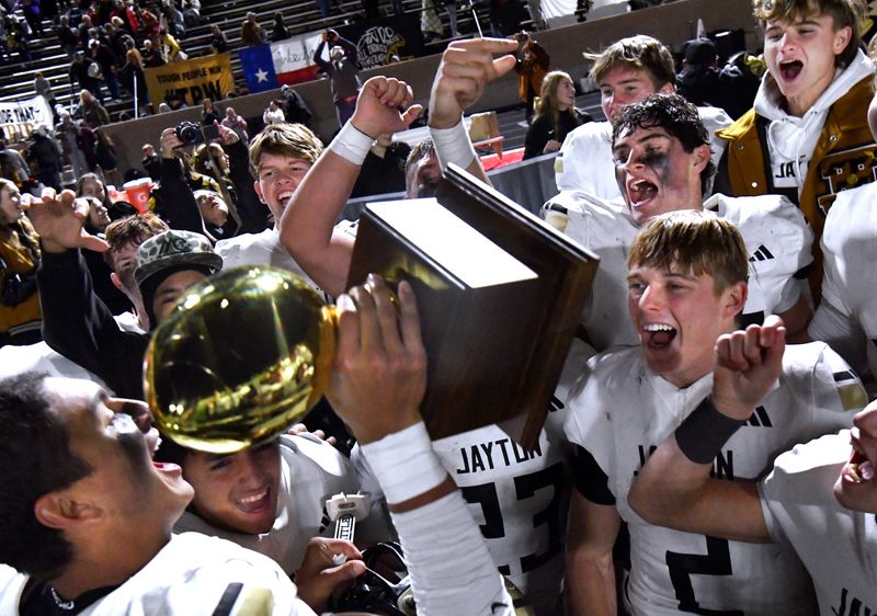 The Jayton High School Jaybirds cheer after winning the Class 1A Division II state semifinal six-man football game against Klondike at Wolf Stadium in Colorado City Friday Dec. 5, 2025. Final score was 64-19, Jayton.