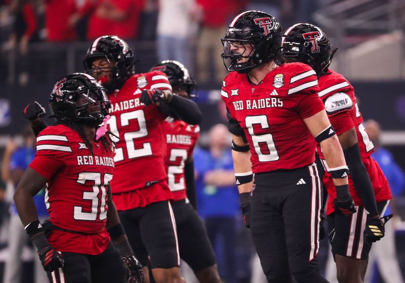 Texas Tech's John Curry celebrates a fourth-down stop against BYU during the Big 12 Conference championship game, Saturday, Nov. 6, 2025, at AT&T Stadium in Arlington.