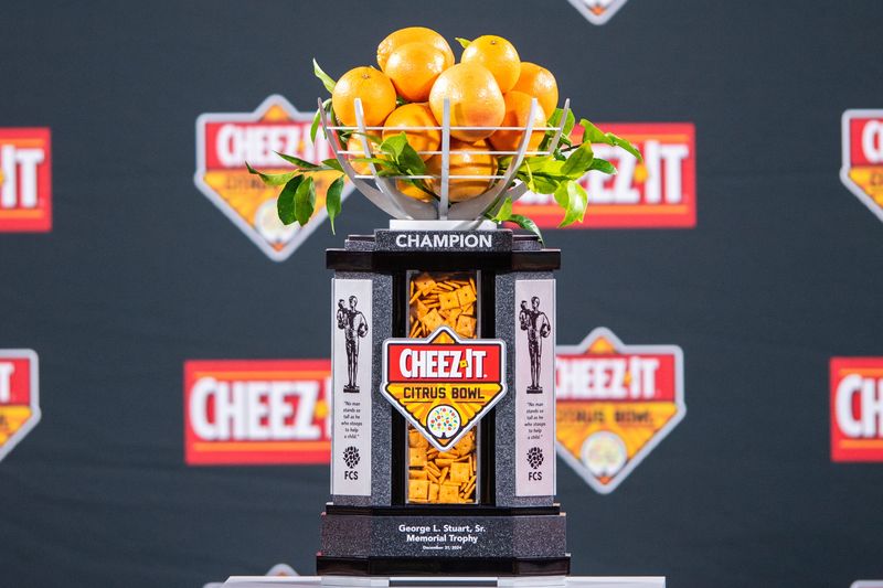 Dec 31, 2024; Orlando, FL, USA; The championship trophy for the Cheeze-It Citrus Bowl at Camping World Stadium. Mandatory Credit: Jeremy Reper-Imagn Images