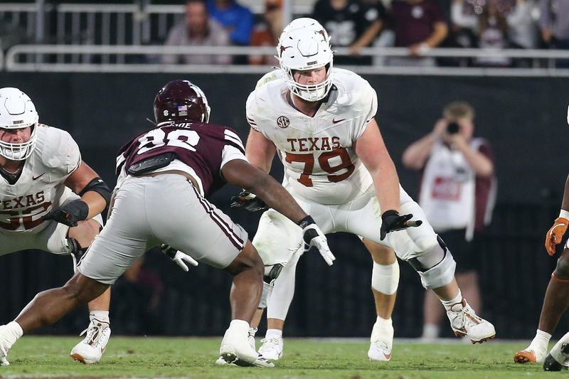 Oct 25, 2025; Starkville, Mississippi, USA; Texas Longhorns offensive linemen Connor Stroh (79) blocks during the fourth quarter against the Mississippi State Bulldogs at Davis Wade Stadium at Scott Field. Mandatory Credit: Petre Thomas-Imagn Images