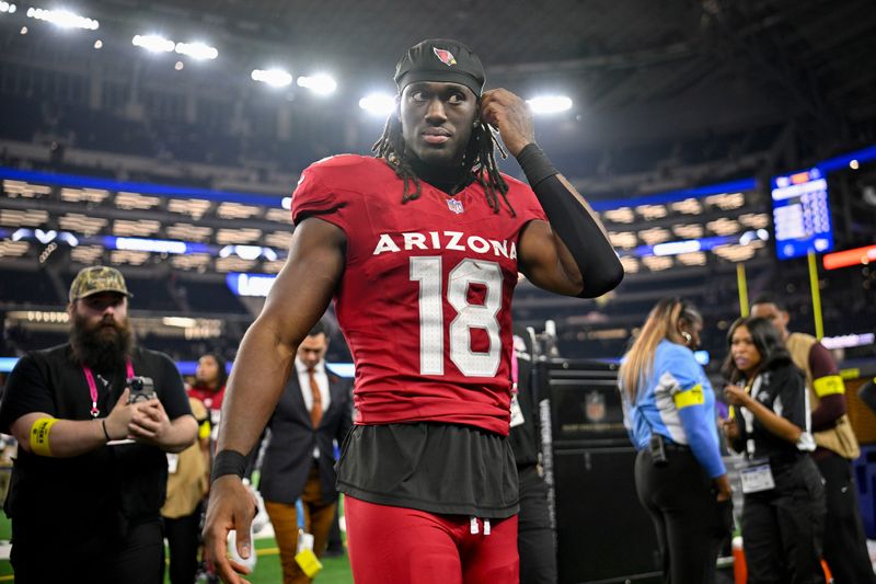 Nov 3, 2025; Arlington, Texas, USA; Arizona Cardinals wide receiver Marvin Harrison Jr. (18) walks off the field after the game between the Dallas Cowboys and the Arizona Cardinals at AT&T Stadium. Mandatory Credit: Jerome Miron-Imagn Images