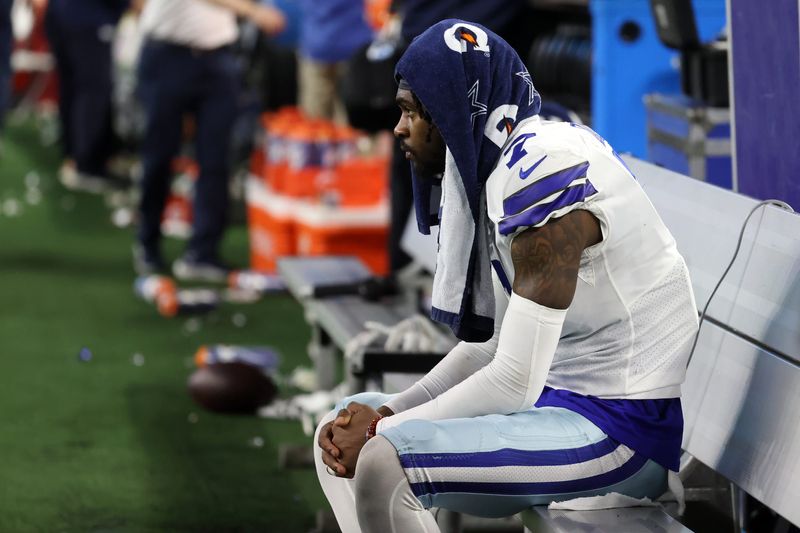 Jan 16, 2022; Arlington, Texas, USA; Dallas Cowboys cornerback Trevon Diggs (7) sits on the bench after being defeated by the San Francisco 49ers in the NFC Wild Card playoff football game at AT&T Stadium. Mandatory Credit: Kevin Jairaj-USA TODAY Sports