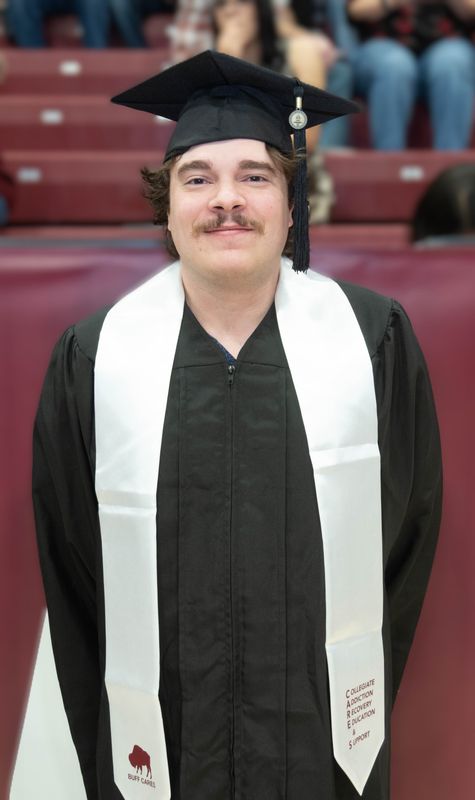 Brinton Renegar poses for a portrait before commencement Saturday, Dec. 13, 2025, at the First United Bank Center at West Texas A&M University.