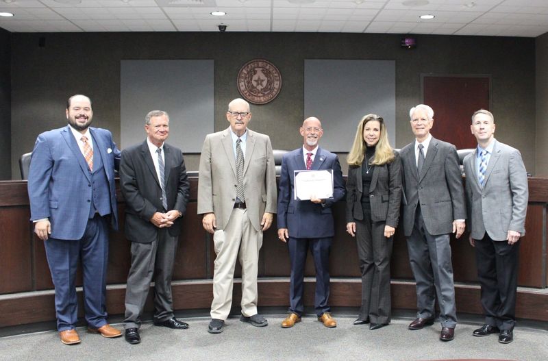 The Randall County Commissioners are seen in this provided photo in 2024, with Legal Counsel and Assistant District Attorney, Richard Gore, who retired recently after 26 years of serving the community. From left are Randall County Commissioners Eric Barry, Tam Boatler, Bob Robinson, Gore, Judge Christy Dyer, Rusty Carnes (retired) and Robert Love.