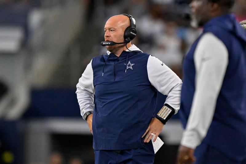 Aug 16, 2025; Arlington, Texas, USA; Dallas Cowboys defensive line coach Aaron Whitecotton during the game between the Dallas Cowboys and the Baltimore Ravens at AT&T Stadium. Mandatory Credit: Jerome Miron-Imagn Images