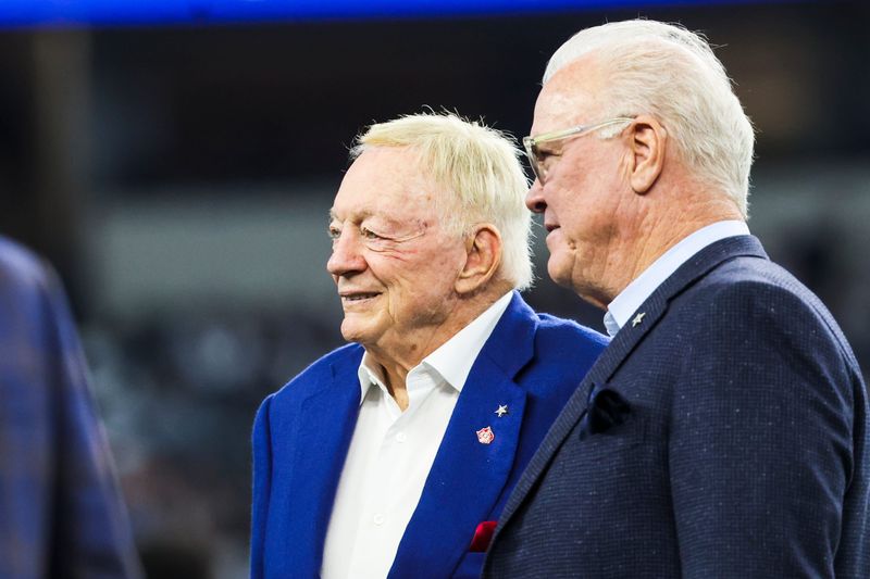 Dec 21, 2025; Arlington, Texas, USA; Dallas Cowboys co-owners Jerry Jones, left, and Stephen Jones, right, stand on the field during pregame warmups against the Los Angeles Chargers at AT&T Stadium. Mandatory Credit: Kevin Jairaj-Imagn Images