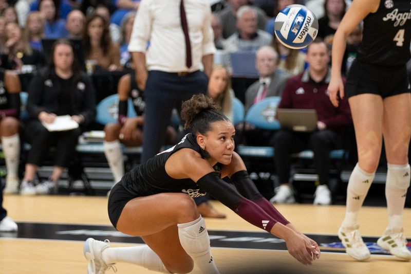 Dec 21, 2025; Kansas City, MO, USA;Texas A&M Aggies outside hitter Kyndal Stowers (37) hits the ball in the second set of the 2025 NCAA Women’s Volleyball Championship at T-Mobile Center.Mandatory Credit: Kylie Graham-Imagn Images