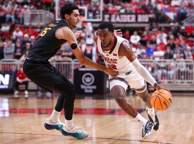 Texas Tech's Donovan Atwell dribbles against Winthrop during a non-conference men's basketball game, Sunday, Dec. 28, 2025, at United Supermarkets Arena.