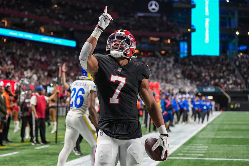 Dec 29, 2025; Atlanta, Georgia, USA; Atlanta Falcons running back Bijan Robinson (7) reacts after catching a touchdown pass against the Los Angeles Rams during the first quarter at Mercedes-Benz Stadium. Mandatory Credit: Dale Zanine-Imagn Images