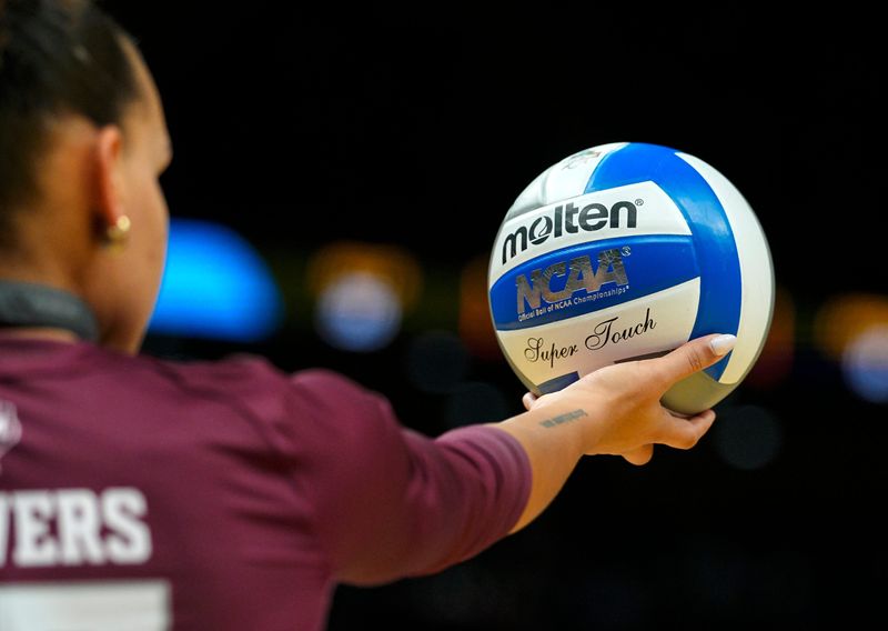 Dec 18, 2025; Kansas City, MO, USA; Texas A&M Aggies outside hitter Kyndal Stowers (37) gets ready to serve during the third set against the Pittsburgh Panthers in a 2025 NCAA Women’s Volleyball Championship semifinal match at T-Mobile Center. Mandatory Credit: Jay Biggerstaff-Imagn Images