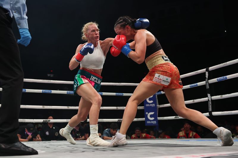SAN JUAN, PUERTO RICO - JANUARY 03: (L-R) Holly Holm punches Stephanie Han in the WBA World Lightweight Championship bout at Coliseo Roberto Clemente on January 03, 2026 in San Juan, Puerto Rico.