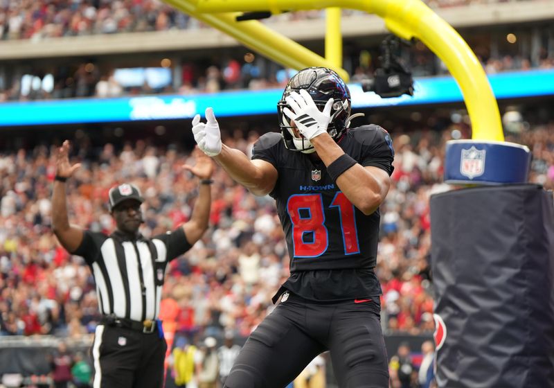 Oct 26, 2025; Houston, Texas, USA; Houston Texans wide receiver Jayden Higgins (81) reacts after catching a pass for a touchdown during the second quarter against the San Francisco 49ers at NRG Stadium. Mandatory Credit: Sean Thomas-Imagn Images