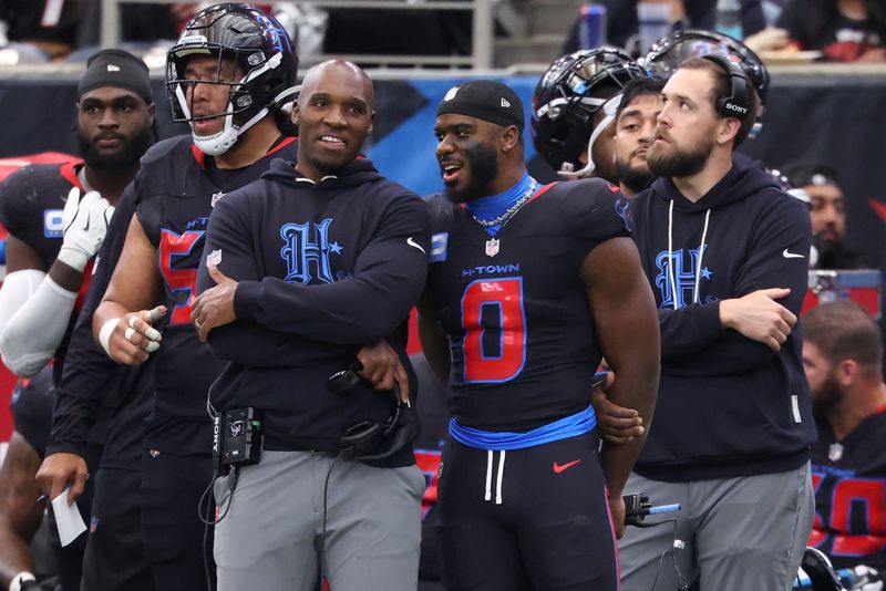 Jan 4, 2026; Houston, Texas, USA; Houston Texans head coach Demeco Ryans on the sidelines with linebacker Azeez al-Shaair (0) during the second half Indianapolis Colts at NRG Stadium. Mandatory Credit: Troy Taormina-Imagn Images