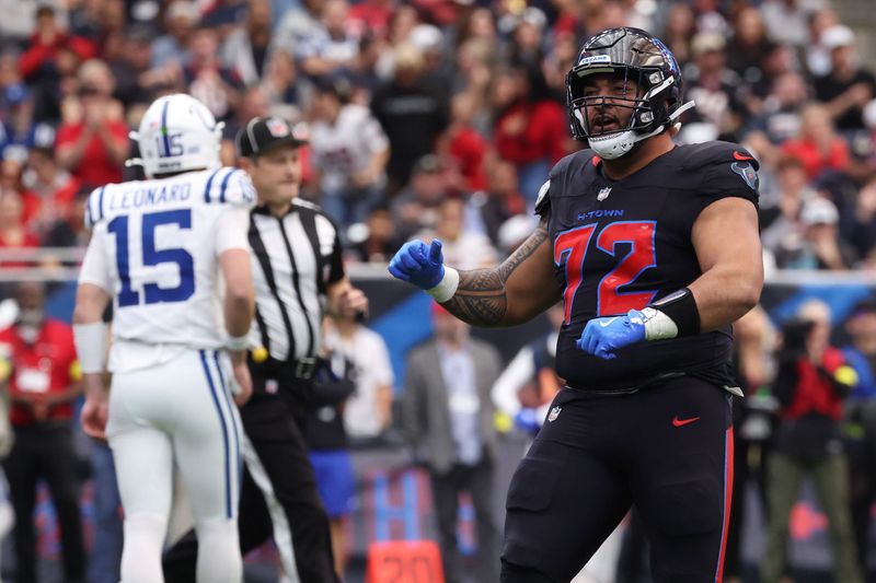 Jan 4, 2026; Houston, Texas, USA; Houston Texans defensive tackle Tommy Togiai (72) reacts after a defensive play against the Indianapolis Colts during the first half at NRG Stadium. Mandatory Credit: Troy Taormina-Imagn Images