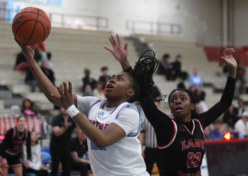 Monterey's Ambrosia Cole shoots against Lubbock-Cooper in a District 3-5A girls basketball game Tuesday, Jan. 6, 2026, at Monterey High School.