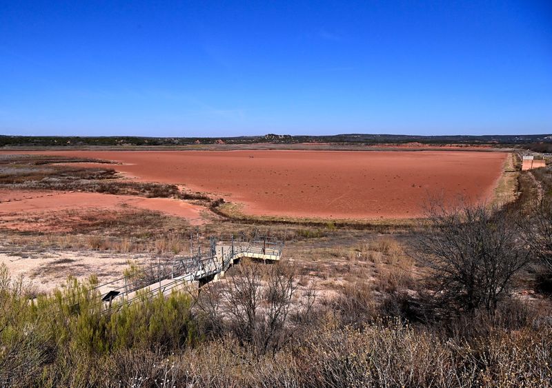 Lake Abilene, as seen from the dam entrance, continues to remain dry Jan. 3. Park officials say the lake usually follows a seven to 10-year cycle of drought and then refills after heavy rains.