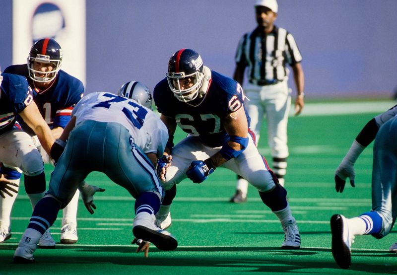 Nov 6, 1988; East Rutherford, NJ, USA; FILE PHOTO; New York Giants left guard Billy Ard (67) in action against Dallas Cowboys defensive tackle Danny Noonan (73) at Giants Stadium during the 1988 season. Mandatory Credit: RVR Photots-USA TODAY Sports