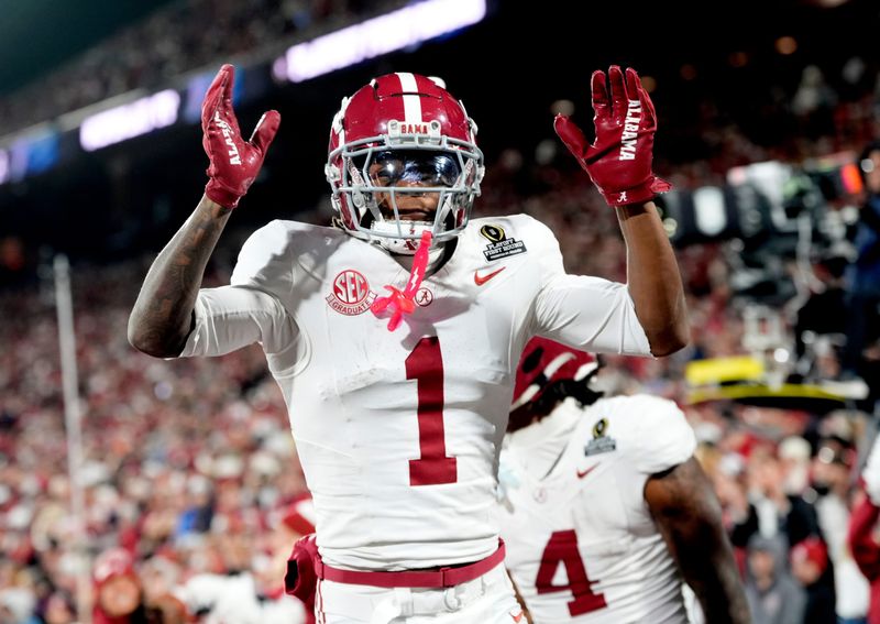 Alabama 's Isaiah Horton (1) celebrates an Alabama touchdown during the College Football Playoff game between the University of Oklahoma Sooners (OU) and the Alabama Crimson Tide at the Gaylord Family - Oklahoma Memorial Stadium in Norman, Okla., Friday Dec. 19, 2025.
