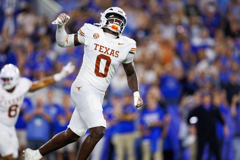 Oct 18, 2025; Lexington, Kentucky, USA; Texas Longhorns linebacker Anthony Hill Jr. (0) celebrates after the Kentucky Wildcats fail to score in overtime at Kroger Field. Mandatory Credit: Jordan Prather-Imagn Images